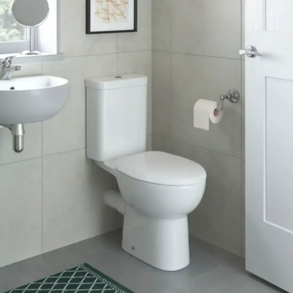 Swept Wall Corner Bath Suite with Standing Basin, Toilet and Taps image 2